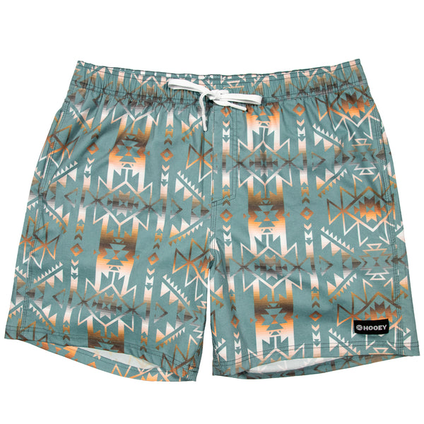 turquoise with white, gold, and grey Aztec pattern board shorts