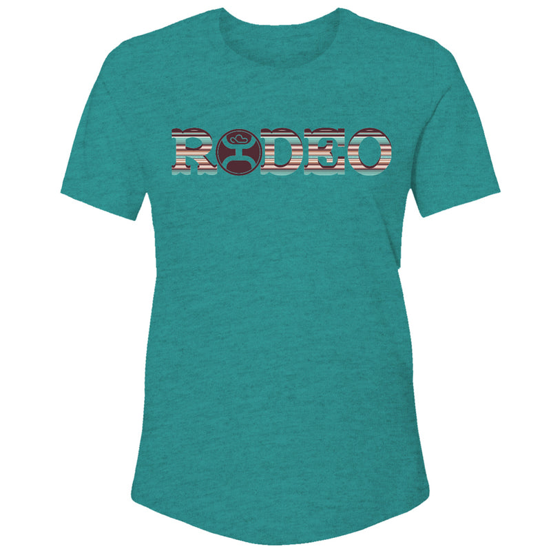 Youth Rodeo tee in heather teal with serape and maroon logo