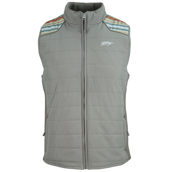 front of green vest with rust and blue stripes on shoulders