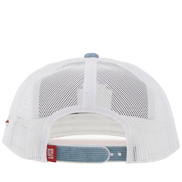 back of blue and white Lone Star hat with white mesh and blue corduroy snap band and red and white lone star tag 