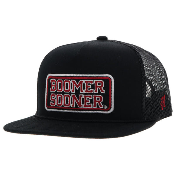 black on black Boomer Sooner hat with red, black, and white embroidered patch