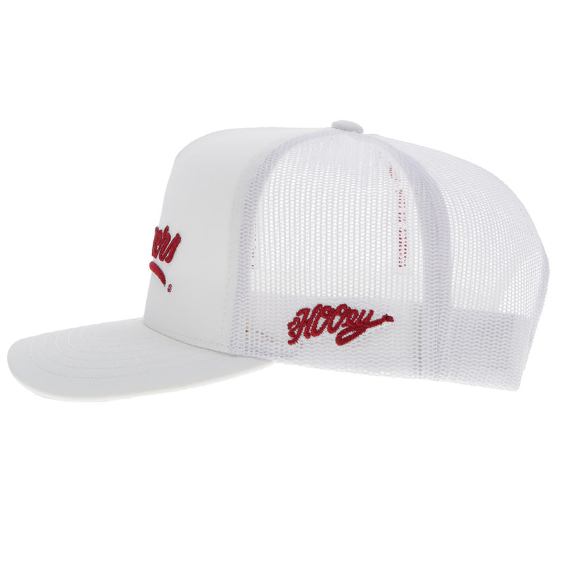 left side view of white Sooners hat with red Hooey logo