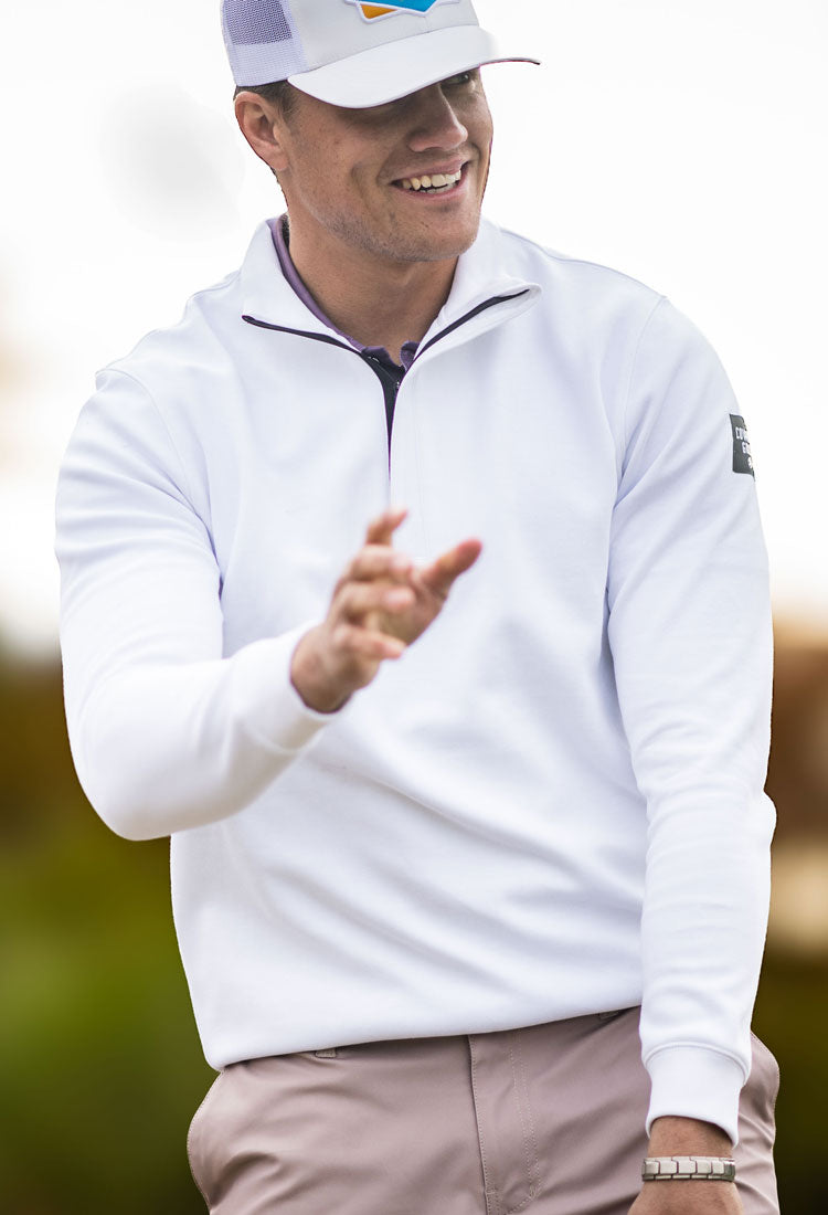 male model posing in hooey golf pullover