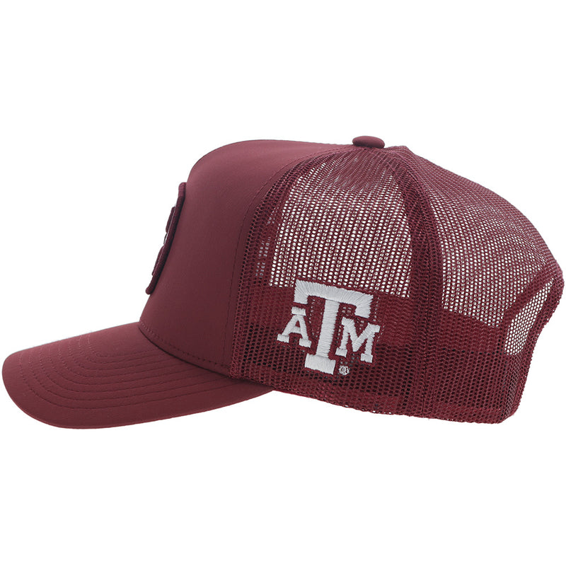 left side of maroon Aggie hat with Texas A&M logo