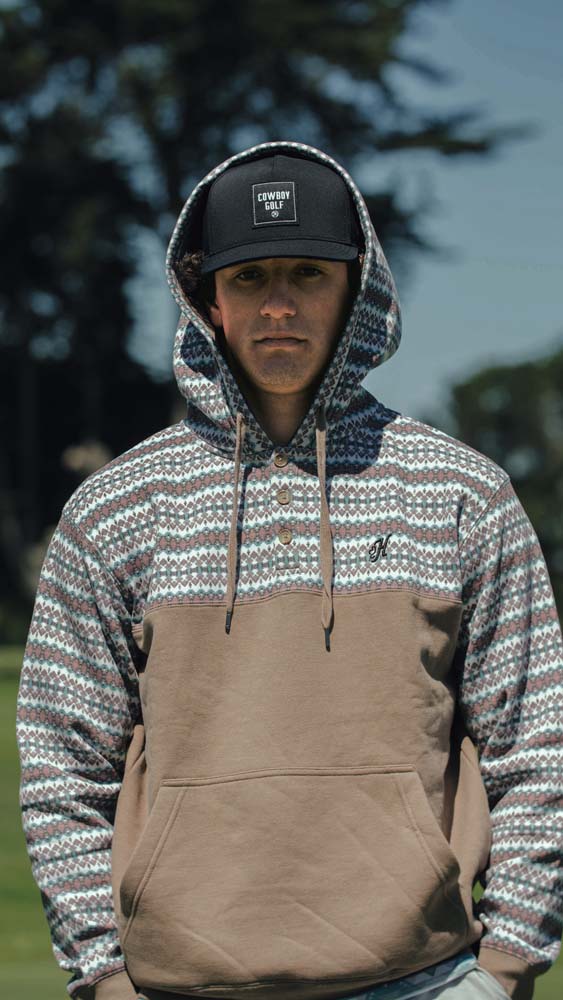 model repping the Jimmy hoody in brown with cream and multi color stripes