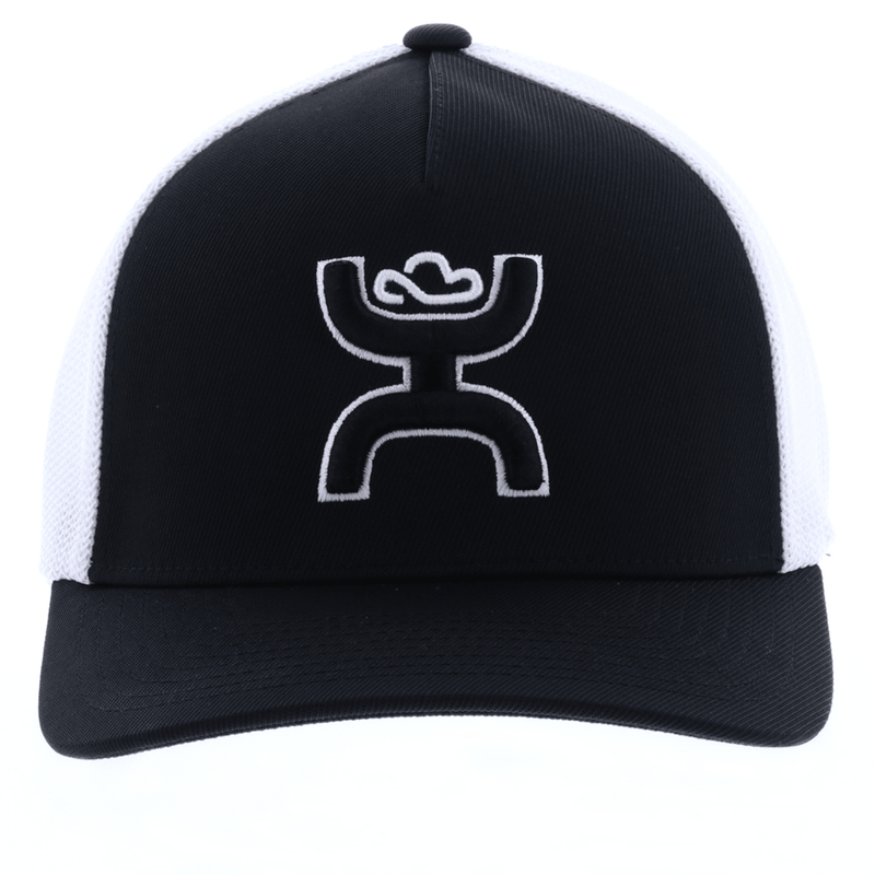 front of the black and white Coach hat