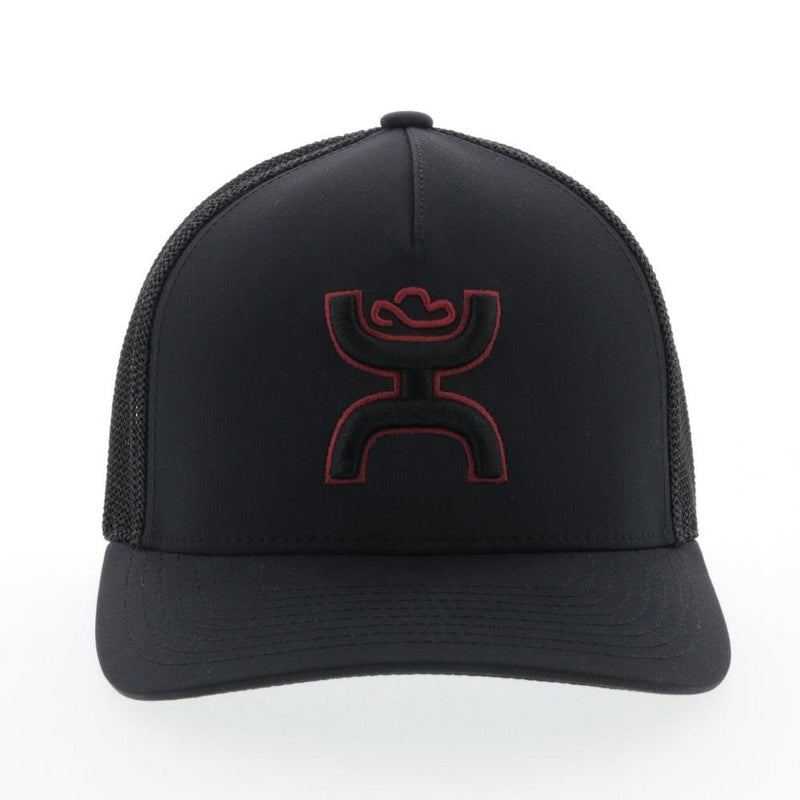 front of the Black on black Coach hat with red and black logo