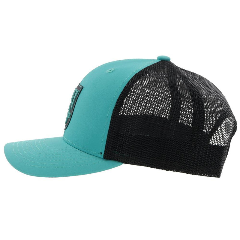 Left side of the Turquoise and black "Bronx" hat