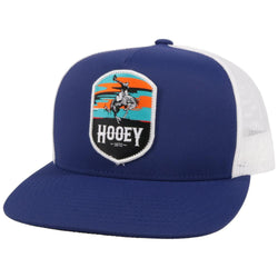 Cheyenne navy and white hat with orange and teal patch