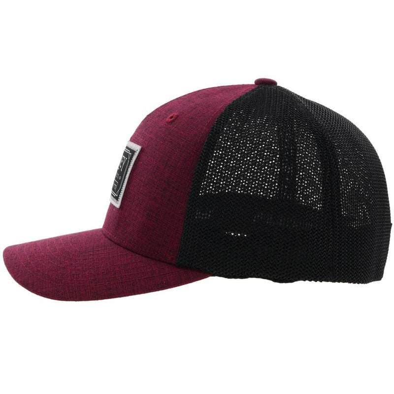 left side of the Doc purple and black hat with black and white patch