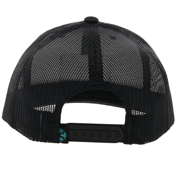 back of the Dock black on black hat with teal and black patch