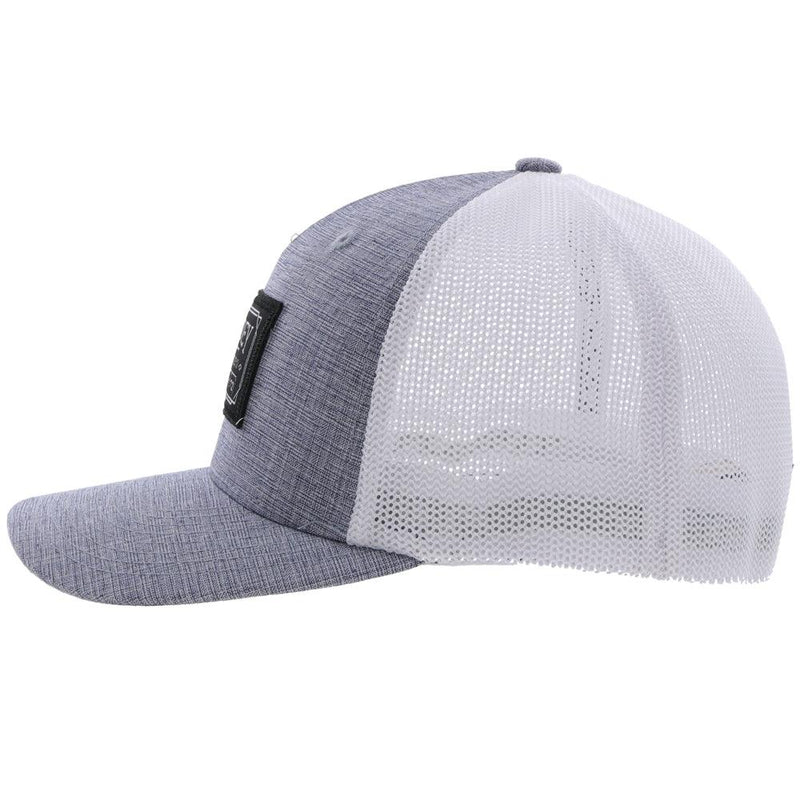 left side of the Doc blue and white flexfit hat with black and white patch