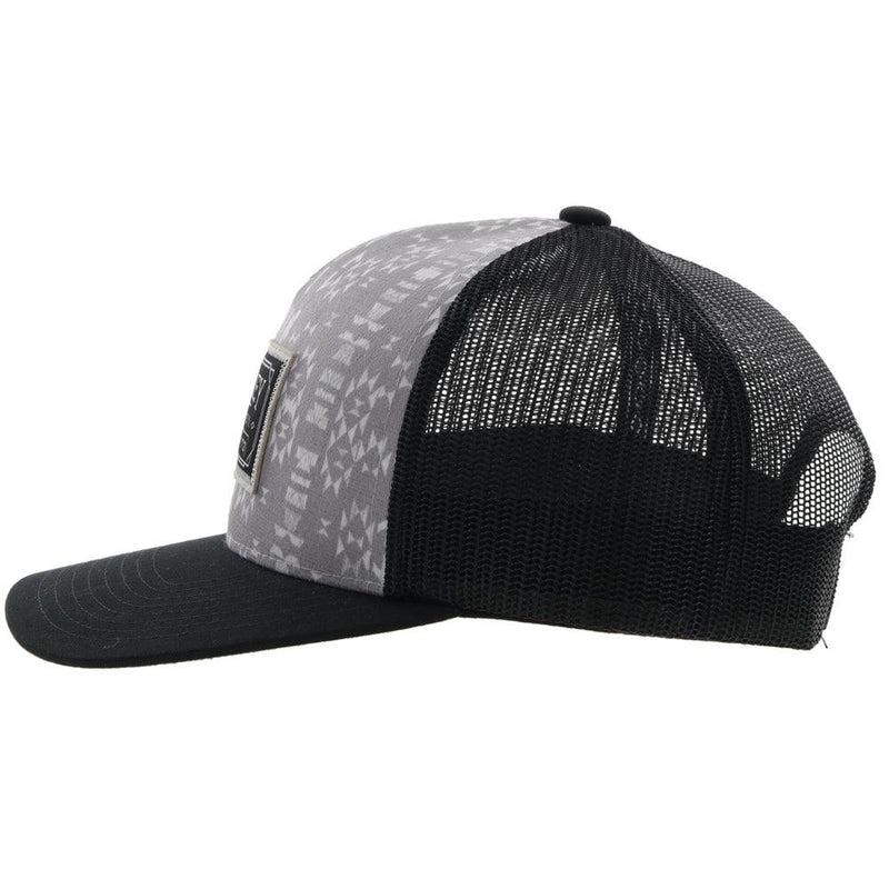 left side of the Doc grey and black hat with Aztec print and black and white patch