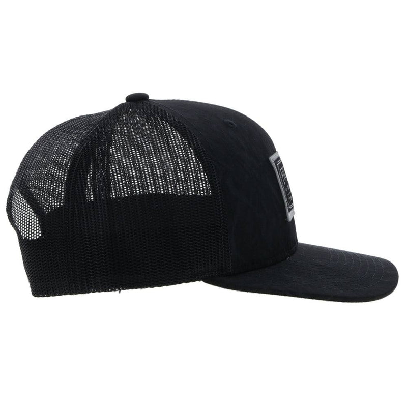 right side of the Doc black on black hat with white and black patch
