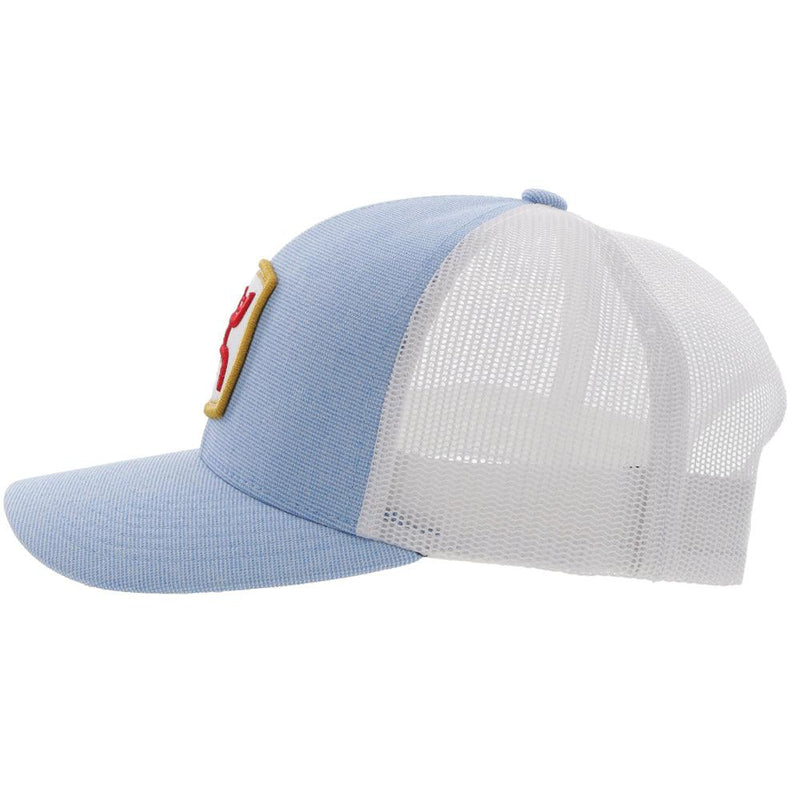 left side of the Zenith blue and white hat with gold, red, and white patch