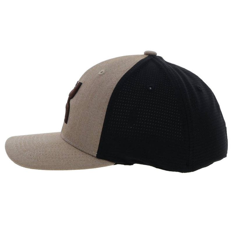 left side of the Tan an black "Ash" flexfit hat with brown Hooey logo