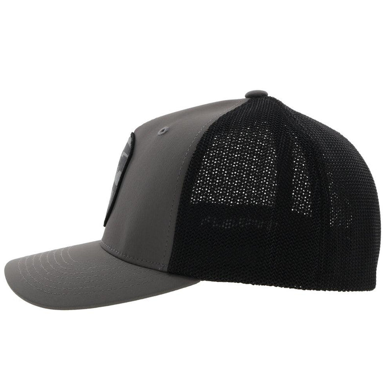 left side of the charcoal and black Cheyenne flexfit hat