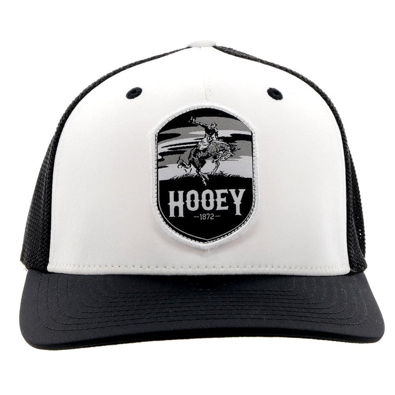 front of the white and black Cheynne hat