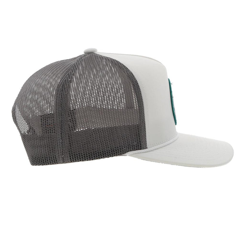 left side of the Pearl white and grey hat with turquoise, blue, and white patch