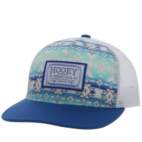 Doc blue and white hat with teal, blue, and white Aztec patter on the front