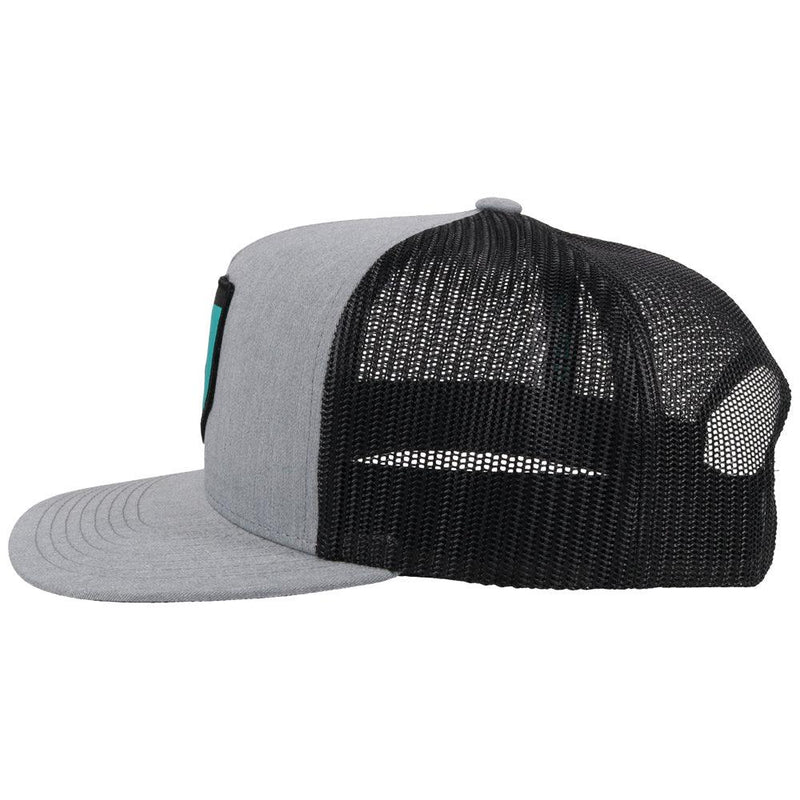 left side of the grey and black tibbs youth hat with teal, white, black patch