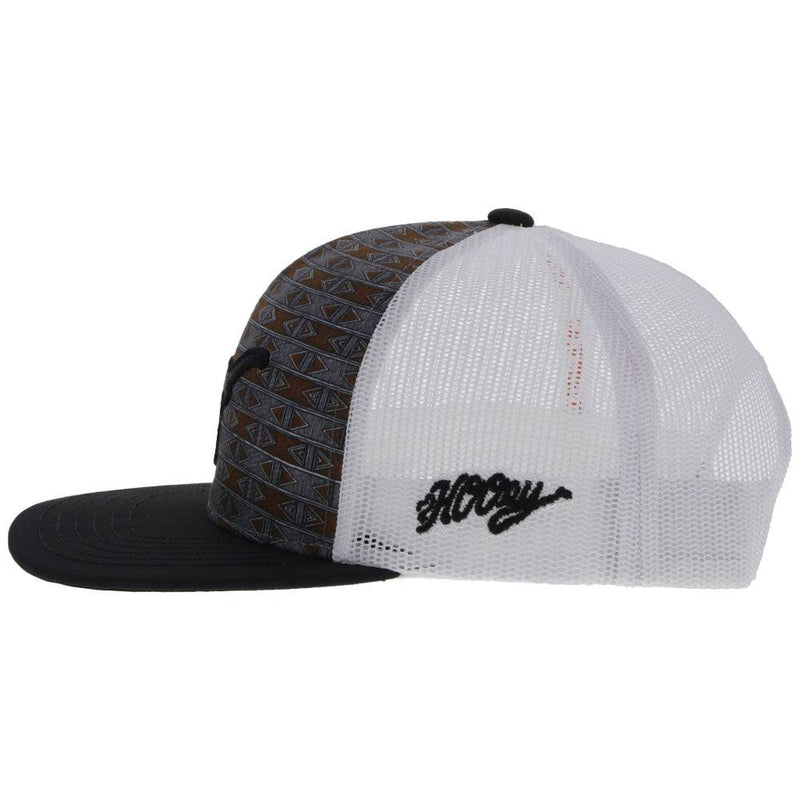 left side of the Texas Long Horns black and white hat with orange and grey aztec pattern and black longhorn patch