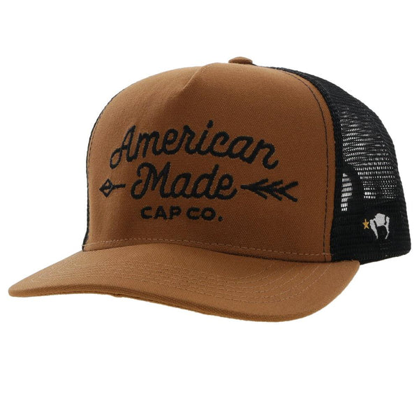 AMCC Hooey tan and black hat with black "American Made Cap Co." stitching 