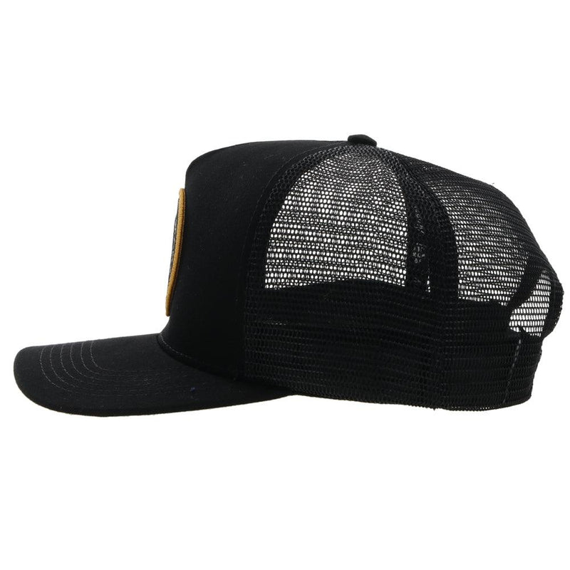 Left side view of the black AMCC hooey hat with the gold and grey logo