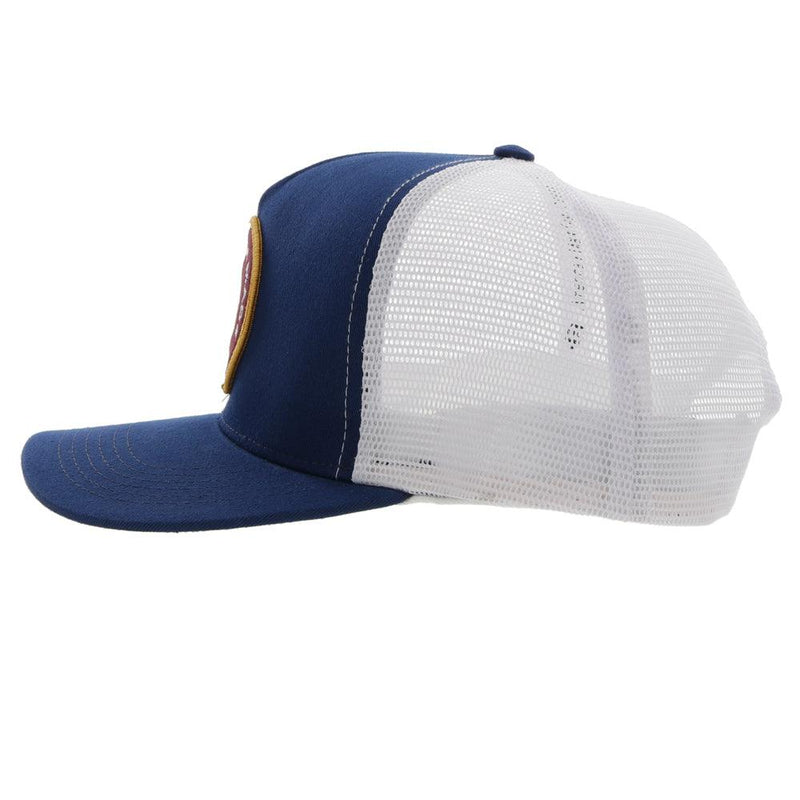left side view of the AMCC navy and white cap