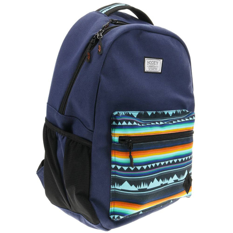side view of the navy backpack with multi colored serape 