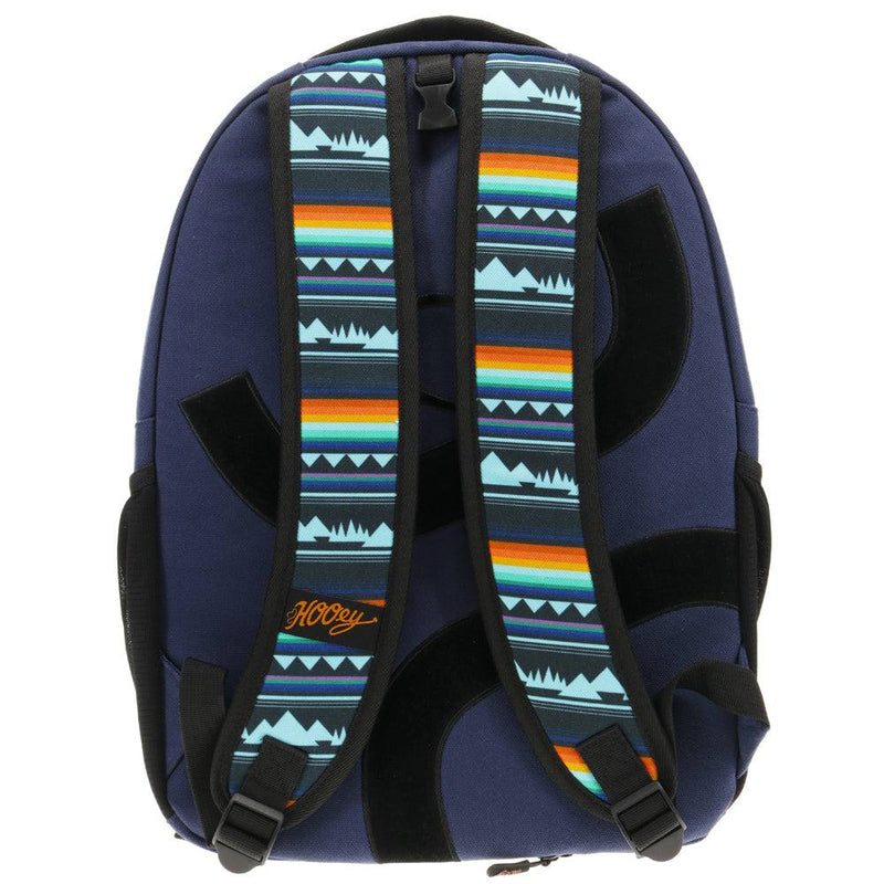 back of the recess navy back pack with navy back pad, black hooey logo, multi colored serape straps