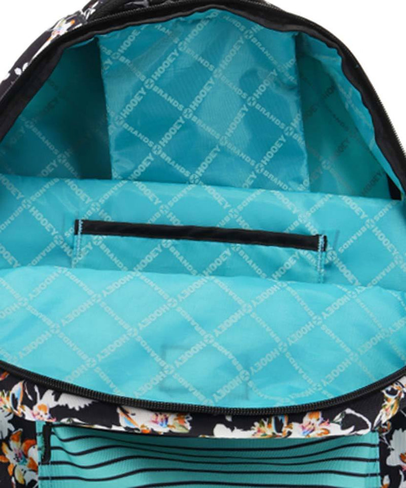 interior of the Recess floral pattern backpack in teal with white logos