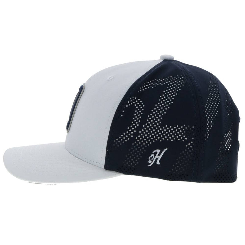 Left side of the Dallas Cowboys white and blue hat with blue "D" logo