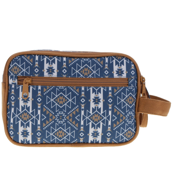 back of the Dopp kit navy and white Aztec pattern and tan leather details