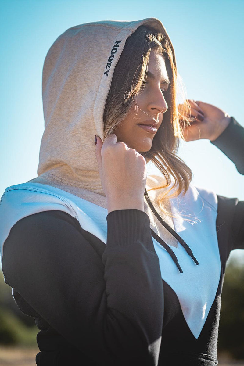 Close up of model wearing the Berkeley black, white, and tan hoody