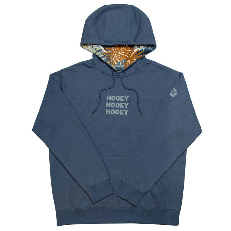 Tres blue hoody with grey logo and multi colored leaf pattern in hood lining
