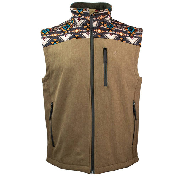 Youth softshell vest in tan with multi colored Aztec print on collar