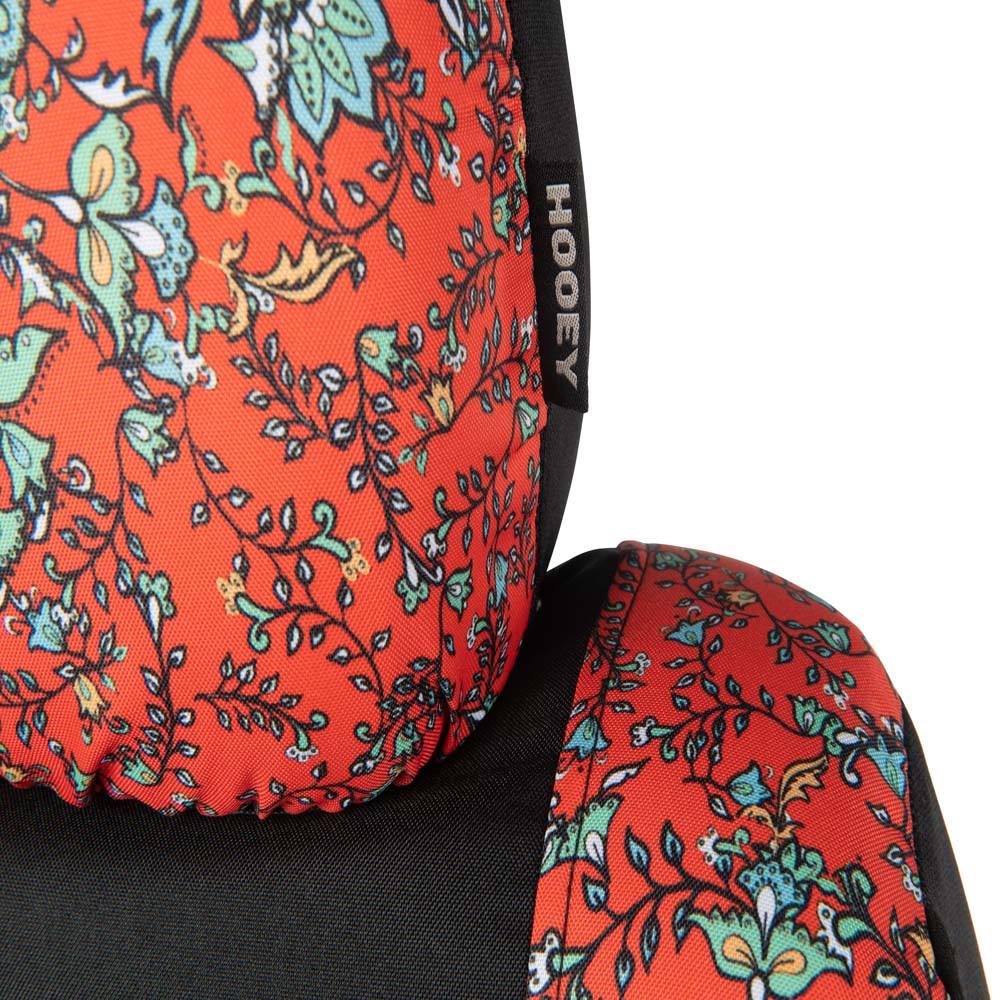 close up of the logo on the headrest portion of western floral red hooey seat cover