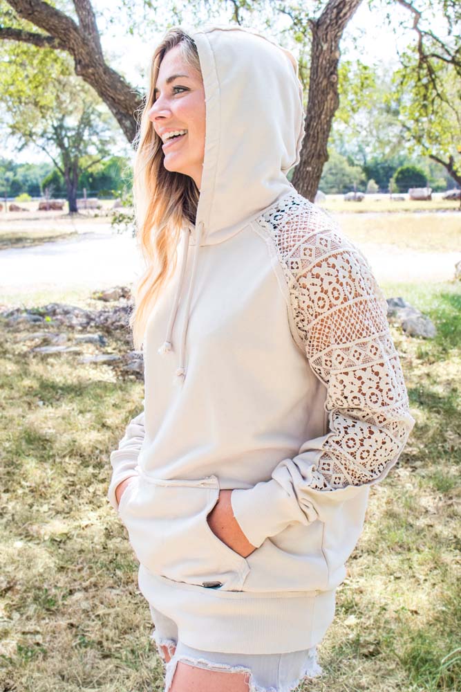 model wearing the Chaparral hoody in tan with crochet mesh